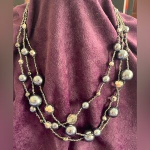 3 strand gun metal necklace.